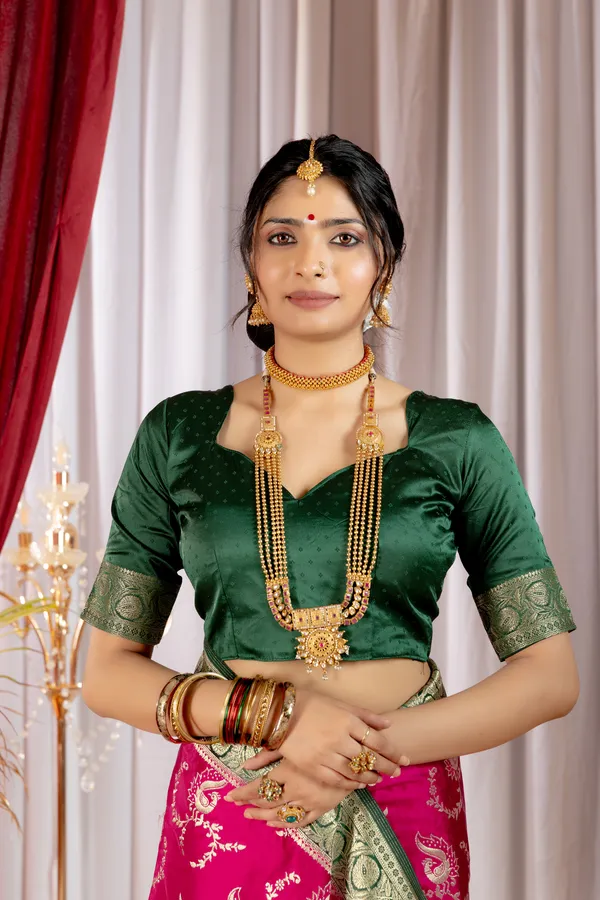 Banarasi_Pure_Satin_Silk_sarees_with_Beautiful_Peacock_in_Contrast_Green-Pink_Shades_With_Attractive_Weaving_Gold_Zari_Design_And_Contrast_Blouse_With_Tassels