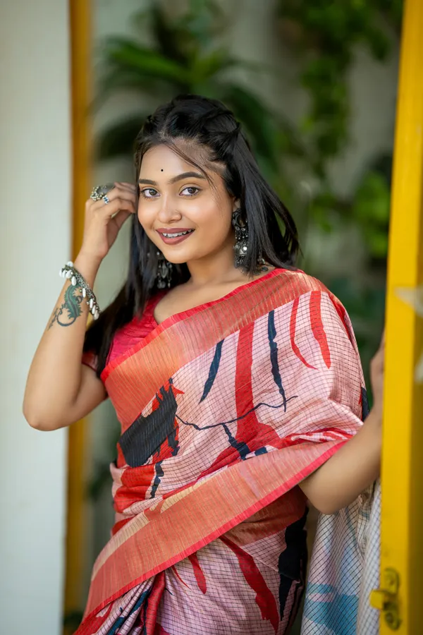 Aarathi_Black_&_Red_–_Aarti_Glow_Diwali_Special_|_Soft_Tussar_Silk_Saree_with_Digital_Print,_Checks_Design_Saree_&_Digital_Print_Blouse_with_Tassels