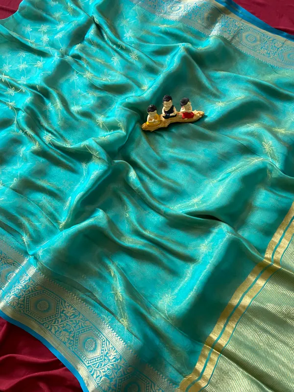 Premium_Soft_Fandy_Satin_sarees_with_Beautiful_Self_Design_Weaving_Pallu_With_Attractive_Traditional_Zari_Weaving_Border_With_All_Over_Self_Weaving_Design_And_Self_Design_Weaving_Blouse_With_Fancy_Tassels
