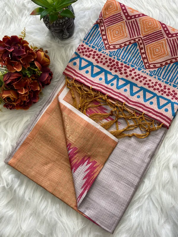 Nikita_Orange_–_Victorious_Aesthetic_Edit_for_You_|_Soft_Kota_Saree_with_Print,_Pallu_&_Contrast_Print_Blouse_with_Tassels