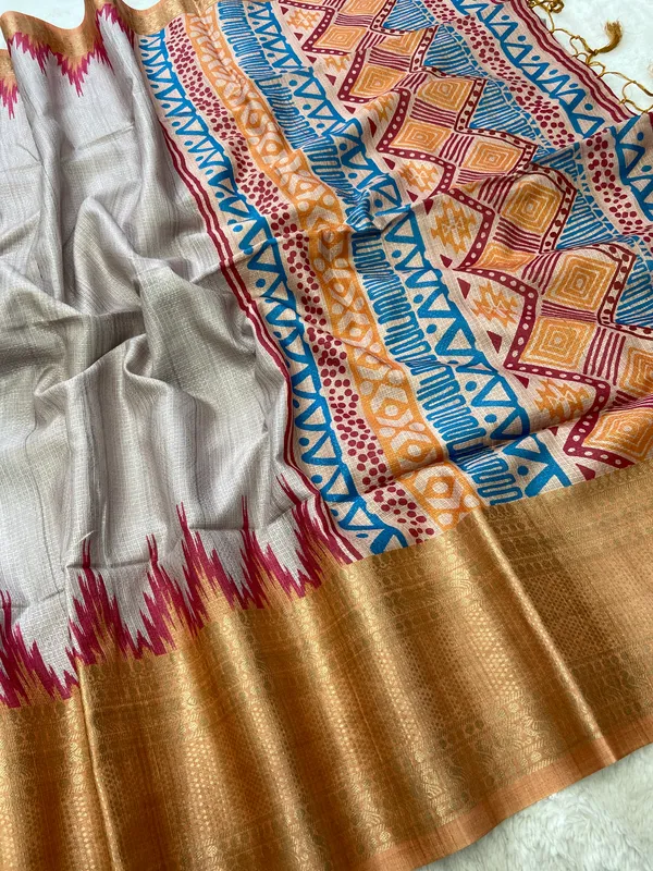Nikita_Orange_–_Victorious_Aesthetic_Edit_for_You_|_Soft_Kota_Saree_with_Print,_Pallu_&_Contrast_Print_Blouse_with_Tassels