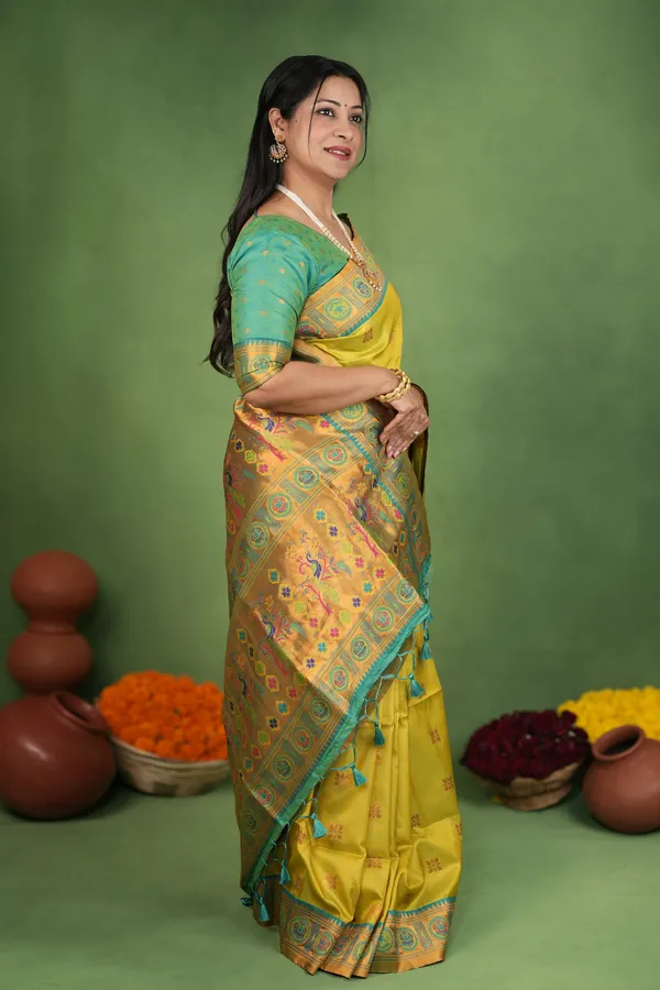 Adhira_Parrot_Green_–_Wedding_Special_|_Premium_Soft_Paithani_Silk_Saree_with_Weaving_Pattern,_Rich_Pallu_&_Border_&_Weaving_Blouse_with_Tassels