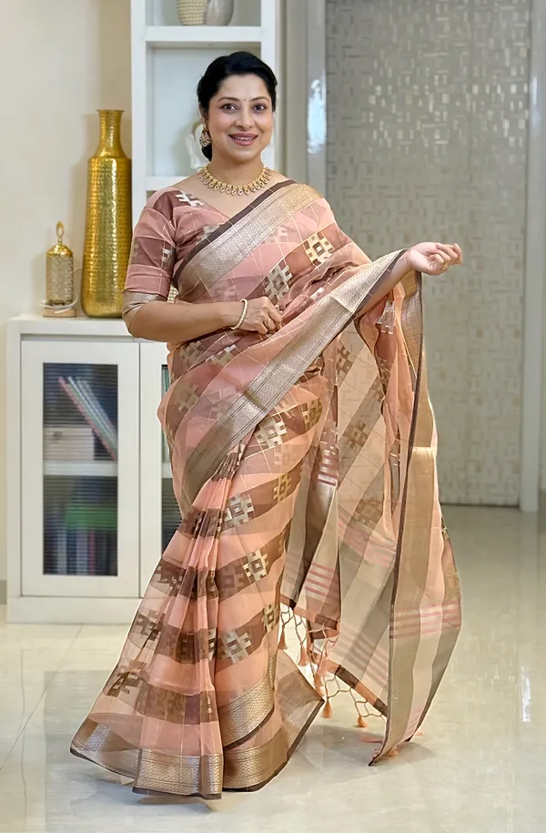Yatika_Peach_–_Diwali_Special_|_Soft_Tissue_Silk_Saree_with_Weaving_Zari_Work,_Border_&_Rich_Pallu_&_Running_Blouse_with_Tassels