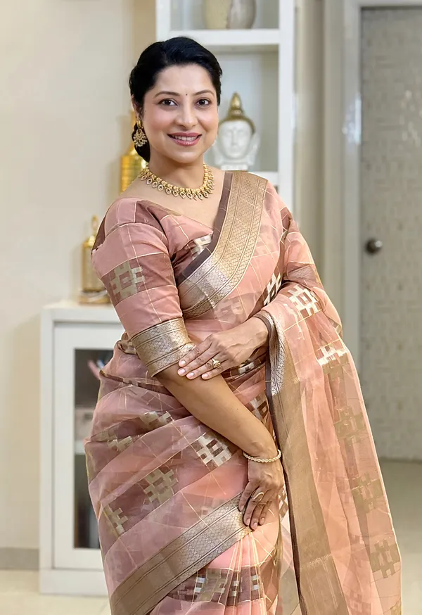 Yatika_Peach_–_Diwali_Special_|_Soft_Tissue_Silk_Saree_with_Weaving_Zari_Work,_Border_&_Rich_Pallu_&_Running_Blouse_with_Tassels