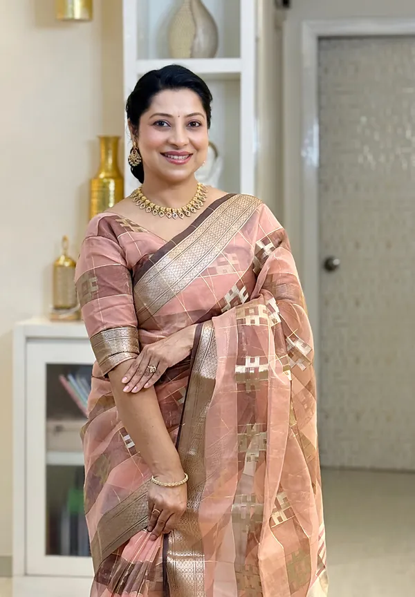 Yatika_Peach_–_Diwali_Special_|_Soft_Tissue_Silk_Saree_with_Weaving_Zari_Work,_Border_&_Rich_Pallu_&_Running_Blouse_with_Tassels