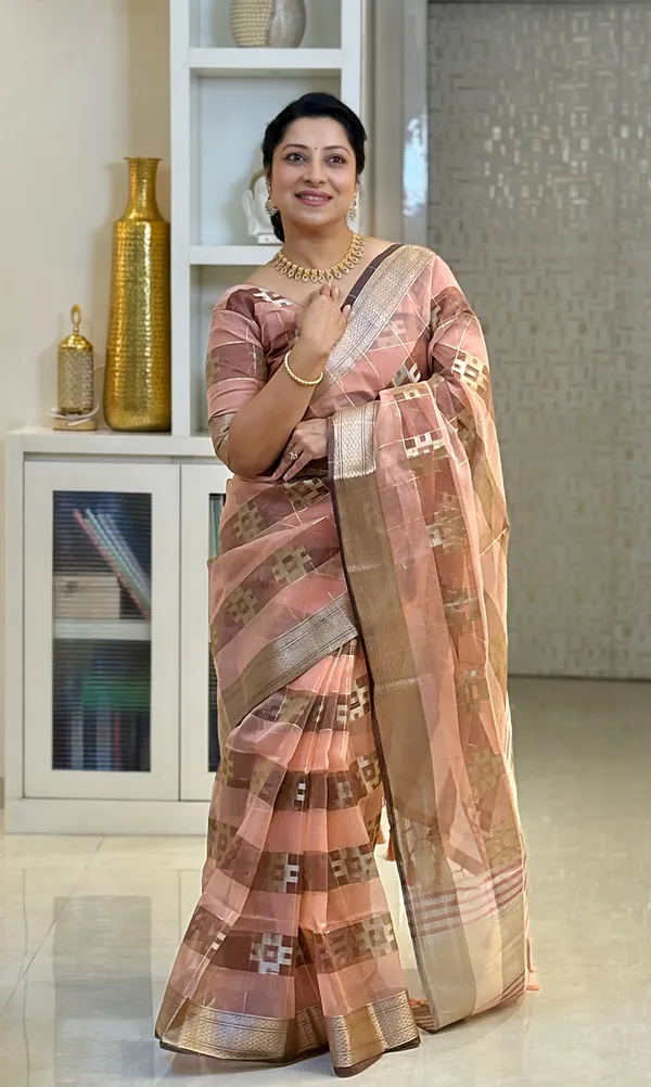 Yatika_Peach_–_Diwali_Special_|_Soft_Tissue_Silk_Saree_with_Weaving_Zari_Work,_Border_&_Rich_Pallu_&_Running_Blouse_with_Tassels