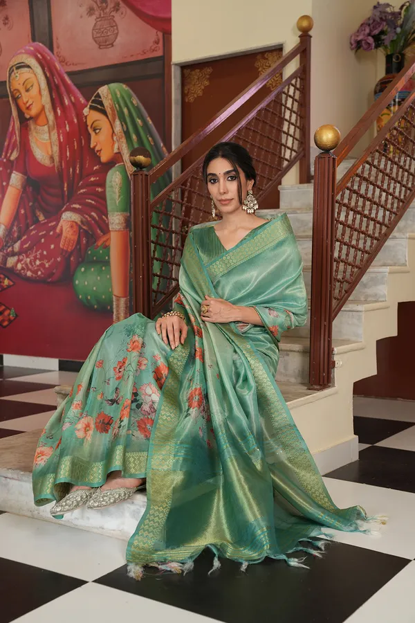 Vaanya_Rama_Green_–_Diwali_Special_|_Soft_Tissue_Silk_Saree_with_Digital_Print,_Border_&_Rich_Pallu,_Sequence_&_Contrast_Print_Blouse_with_Tassels