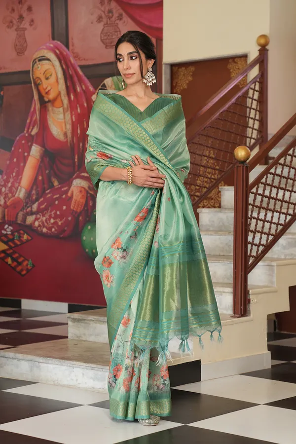 Vaanya_Rama_Green_–_Diwali_Special_|_Soft_Tissue_Silk_Saree_with_Digital_Print,_Border_&_Rich_Pallu,_Sequence_&_Contrast_Print_Blouse_with_Tassels