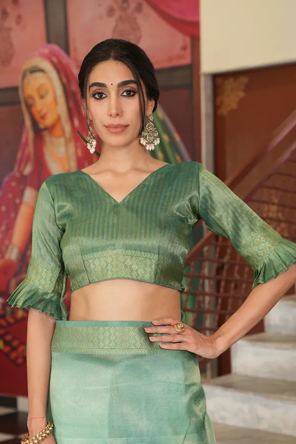 Vaanya_Rama_Green_–_Diwali_Special_|_Soft_Tissue_Silk_Saree_with_Digital_Print,_Border_&_Rich_Pallu,_Sequence_&_Contrast_Print_Blouse_with_Tassels