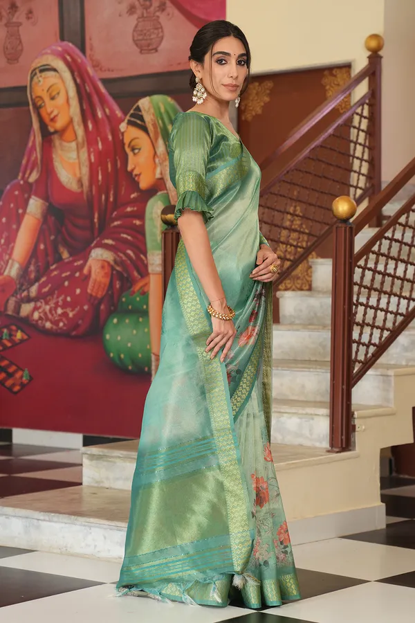 Vaanya_Rama_Green_–_Diwali_Special_|_Soft_Tissue_Silk_Saree_with_Digital_Print,_Border_&_Rich_Pallu,_Sequence_&_Contrast_Print_Blouse_with_Tassels