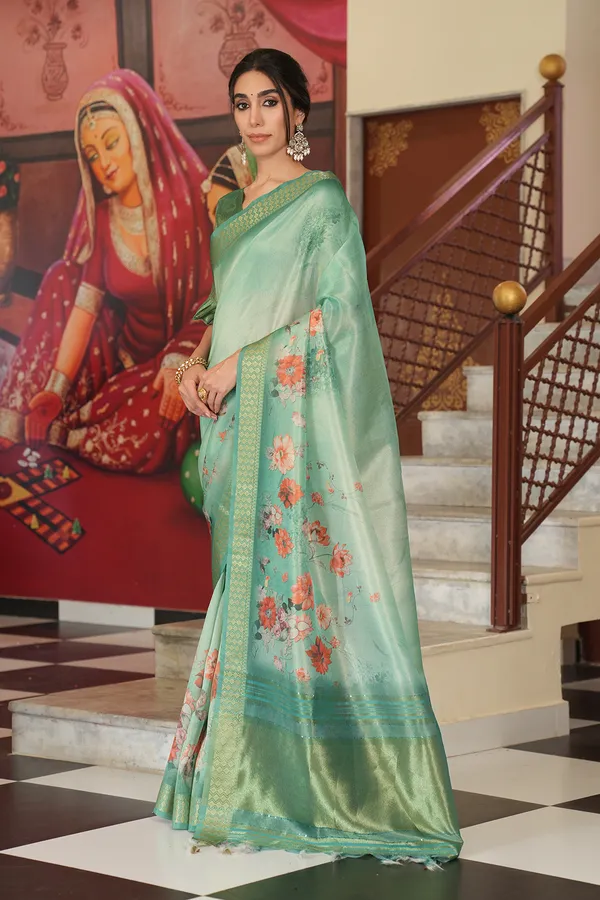 Vaanya_Rama_Green_–_Diwali_Special_|_Soft_Tissue_Silk_Saree_with_Digital_Print,_Border_&_Rich_Pallu,_Sequence_&_Contrast_Print_Blouse_with_Tassels