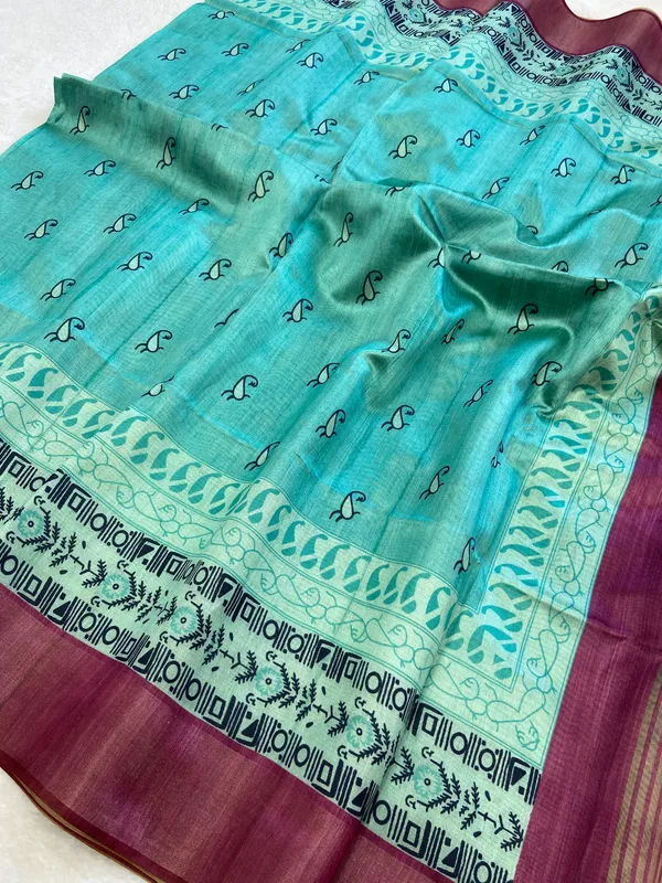 Soft_Tussar_Silk_sarees_with_Beautiful_Print_With_Attractive_Border_And_Contrast_Print_Blouse_With_Tassels