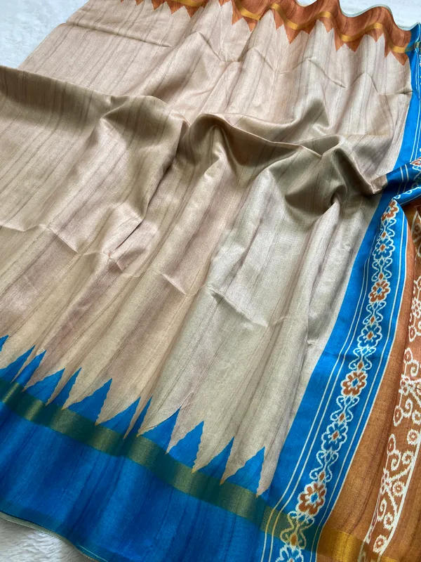 Soft_Tussar_Silk_sarees_with_Beautiful_Print_With_Attractive_Border_And_Contrast_Print_Blouse_With_Tassels