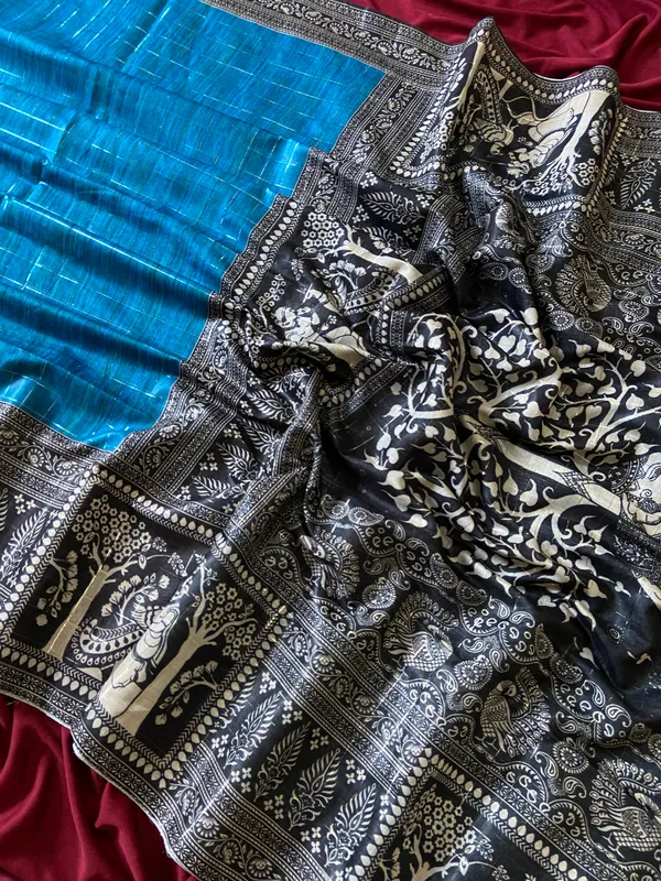 Mridula_Blue_–_Soft_Navratri_Special_|_Soft_Semi_Tussar_Silk_Saree_with_Digital_Print,_Border_&_Contrast_Print_Blouse_with_Tassels
