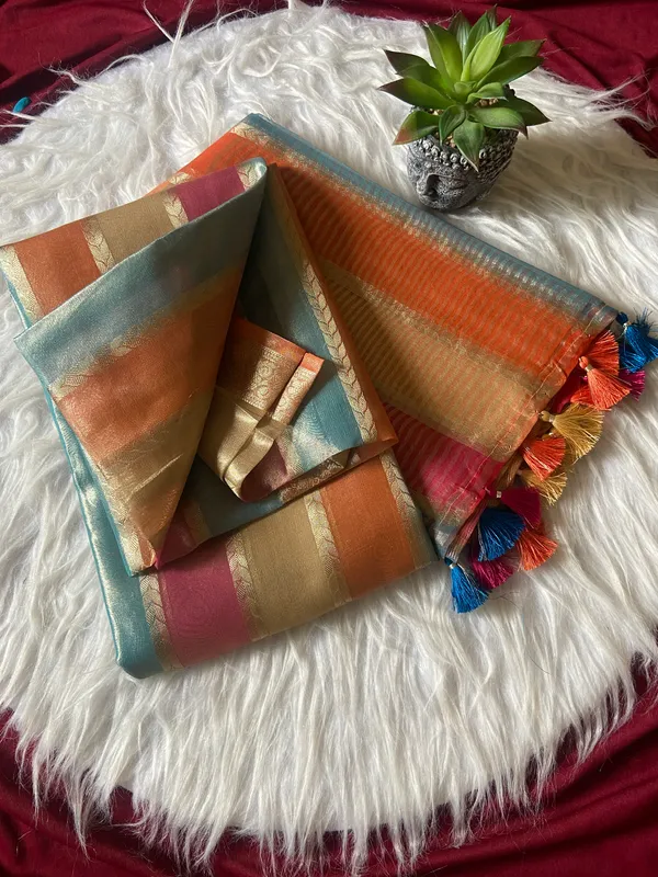 Soft_Tissue_Silk_sarees_with_Beautiful_Weaving_With_Attractive_Design_And_Weaving_Blouse_With_Tassels_in_new_styles_n_new_look