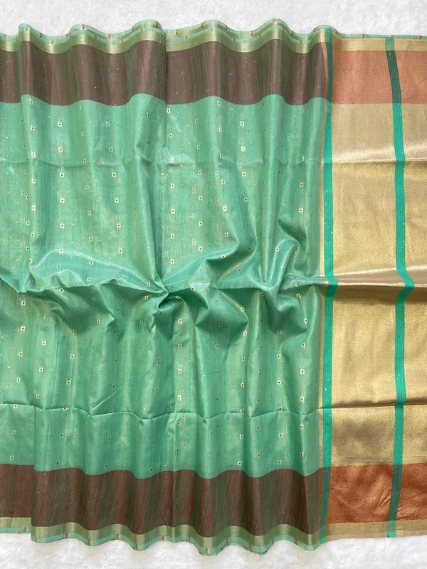 Sarika_Rama_Green_–_Diwali_Special_|_Soft_Tissue_Linen_Silk_Saree_with_Weaving,_Border_&_Rich_Pallu,_Sequence_&_Running_Blouse_with_Tassels