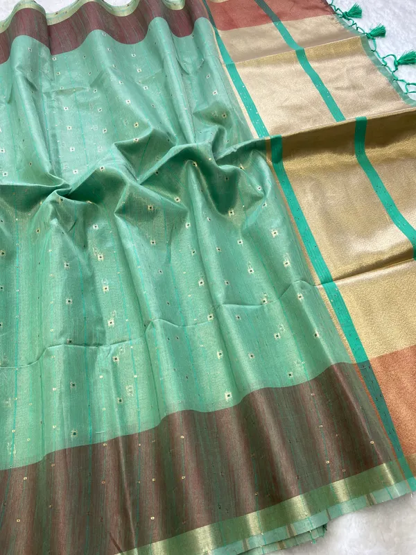 Sarika_Rama_Green_–_Diwali_Special_|_Soft_Tissue_Linen_Silk_Saree_with_Weaving,_Border_&_Rich_Pallu,_Sequence_&_Running_Blouse_with_Tassels