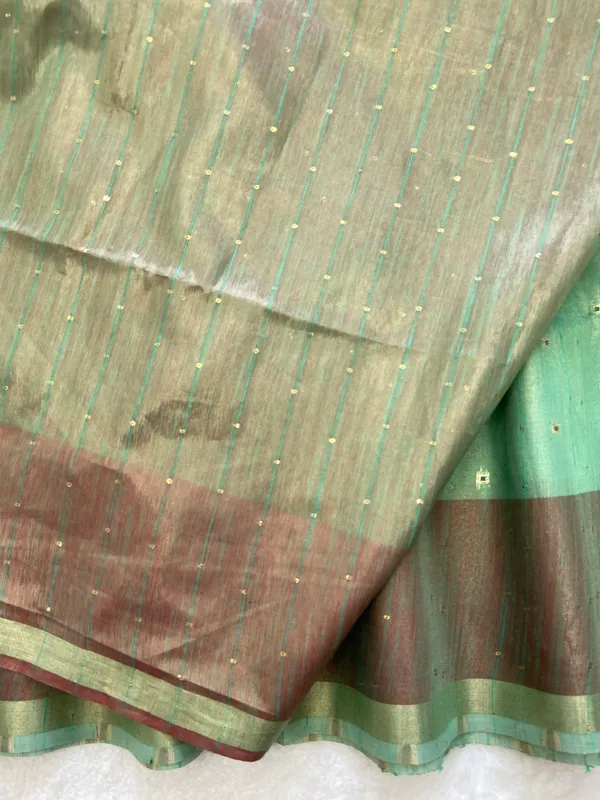 Sarika_Rama_Green_–_Diwali_Special_|_Soft_Tissue_Linen_Silk_Saree_with_Weaving,_Border_&_Rich_Pallu,_Sequence_&_Running_Blouse_with_Tassels
