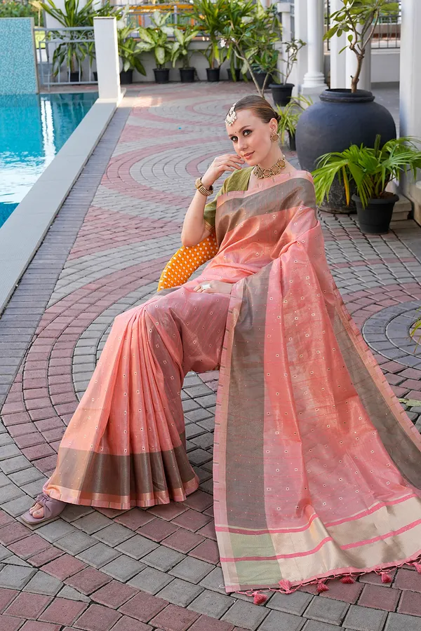 Soft_Tissue_Linen_Silk_sarees_with_Beautiful_Weaving_With_Attractive_Border_&_Rich_Pallu_With_Sequence_And_Running_Blouse_With_Tassels