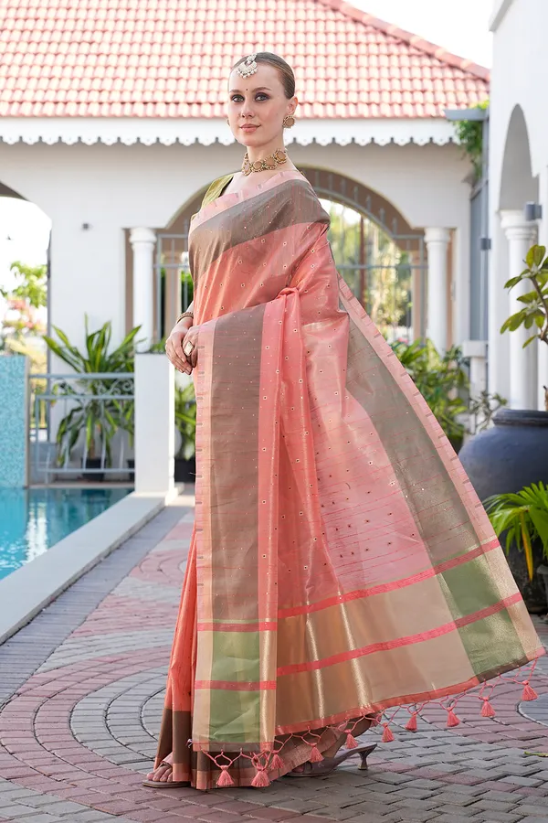 Soft_Tissue_Linen_Silk_sarees_with_Beautiful_Weaving_With_Attractive_Border_&_Rich_Pallu_With_Sequence_And_Running_Blouse_With_Tassels