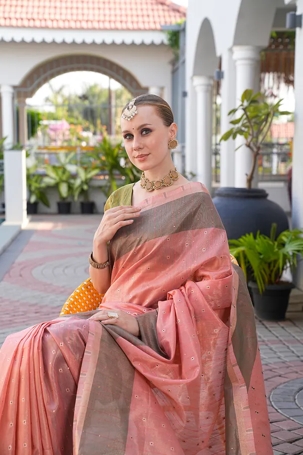Soft_Tissue_Linen_Silk_sarees_with_Beautiful_Weaving_With_Attractive_Border_&_Rich_Pallu_With_Sequence_And_Running_Blouse_With_Tassels