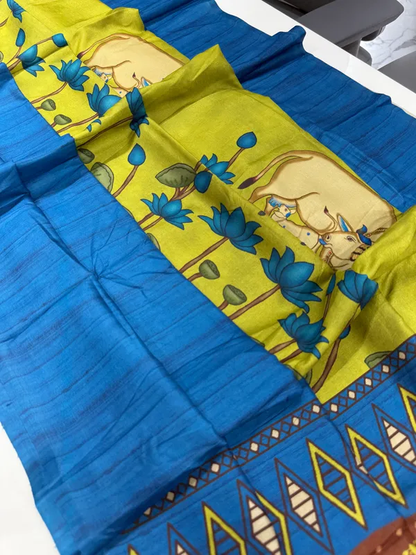 Cow_Blue_–_Cow_Motif_Navratri_Special_|_Soft_Desi_Tussar_Silk_Saree_with_Digital_Print,_Border_&_Contrast_Print_Blouse_with_Tassels