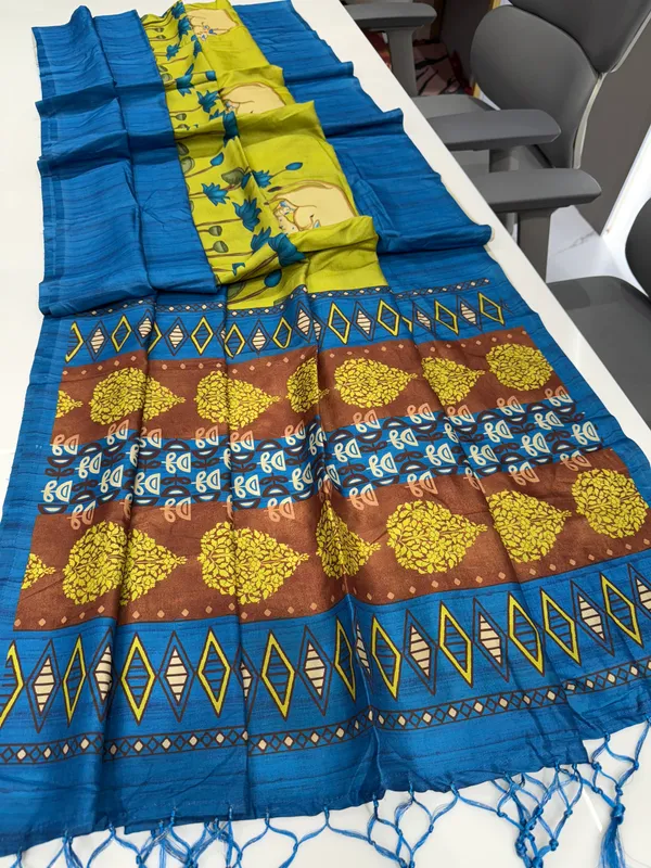 Cow_Blue_–_Cow_Motif_Navratri_Special_|_Soft_Desi_Tussar_Silk_Saree_with_Digital_Print,_Border_&_Contrast_Print_Blouse_with_Tassels