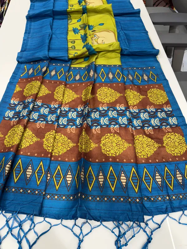 Cow_Blue_–_Cow_Motif_Navratri_Special_|_Soft_Desi_Tussar_Silk_Saree_with_Digital_Print,_Border_&_Contrast_Print_Blouse_with_Tassels