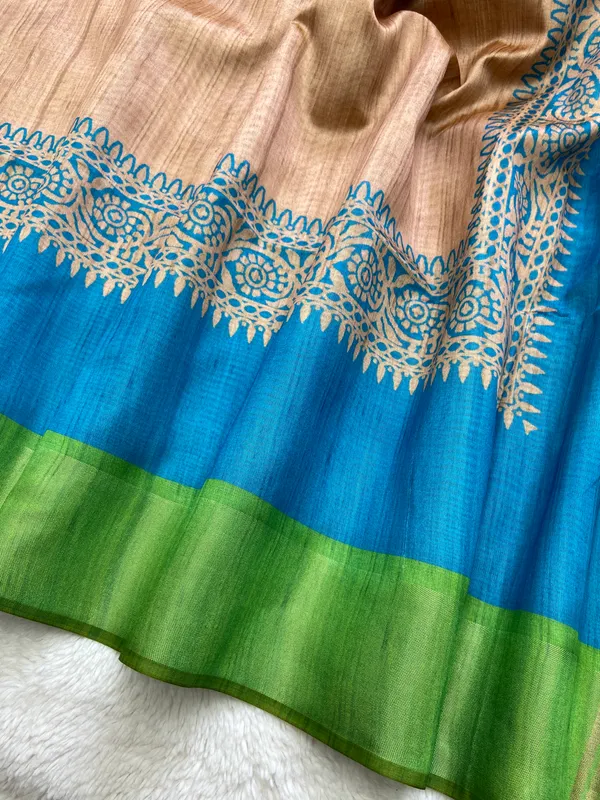 Bhanumati_Green_–_Navratri_Special_|_Soft_Tussar_Silk_Saree_with_Print,_Border_&_Contrast_Print_Blouse_with_Tassels