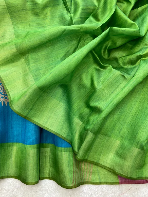 Bhanumati_Green_–_Navratri_Special_|_Soft_Tussar_Silk_Saree_with_Print,_Border_&_Contrast_Print_Blouse_with_Tassels