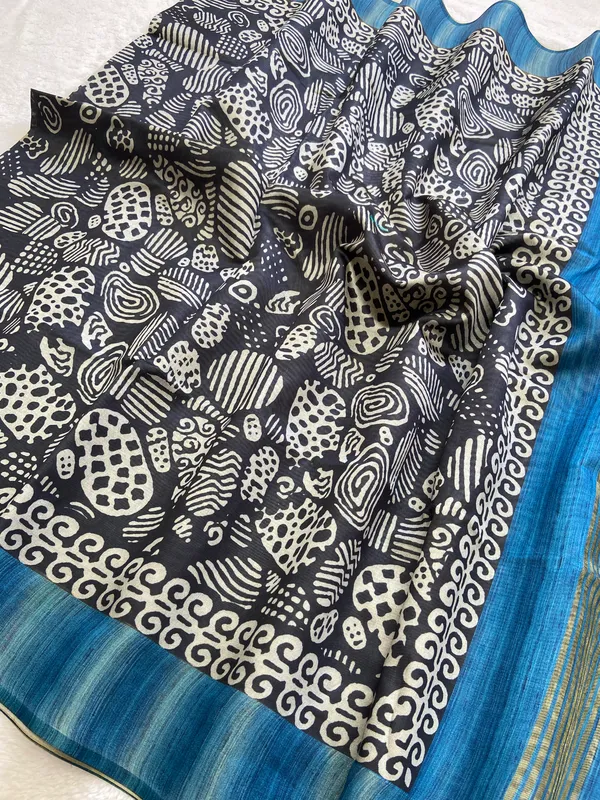 Deepali_Blue_–_Row_of_Lamps_Diwali_Special_|_Soft_Tussar_Silk_Saree_with_Print,_Border_&_Contrast_Print_Blouse_with_Tassels