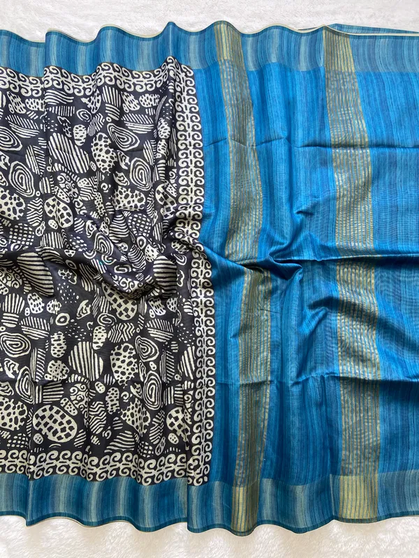 Deepali_Blue_–_Row_of_Lamps_Diwali_Special_|_Soft_Tussar_Silk_Saree_with_Print,_Border_&_Contrast_Print_Blouse_with_Tassels