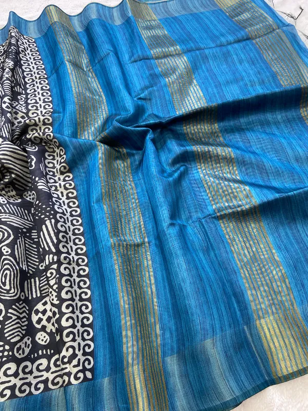 Deepali_Blue_–_Row_of_Lamps_Diwali_Special_|_Soft_Tussar_Silk_Saree_with_Print,_Border_&_Contrast_Print_Blouse_with_Tassels