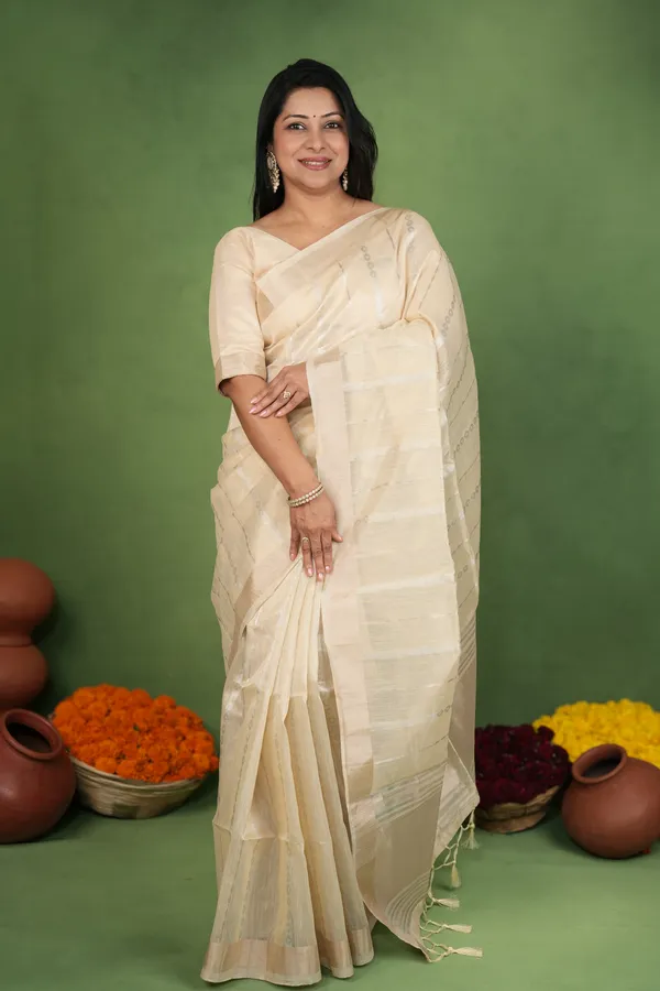 Soft_Linen_Cotton_Silk_sarees_with_Beautiful_Weaving__Zari_Butti_Design_With_Attractive_Border_&_Rich_Pallu__And_Running__Plain_Blouse_With_Tassels