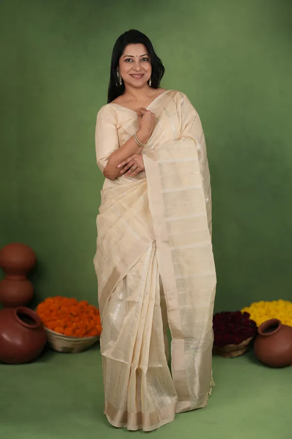 Soft_Linen_Cotton_Silk_sarees_with_Beautiful_Weaving__Zari_Butti_Design_With_Attractive_Border_&_Rich_Pallu__And_Running__Plain_Blouse_With_Tassels