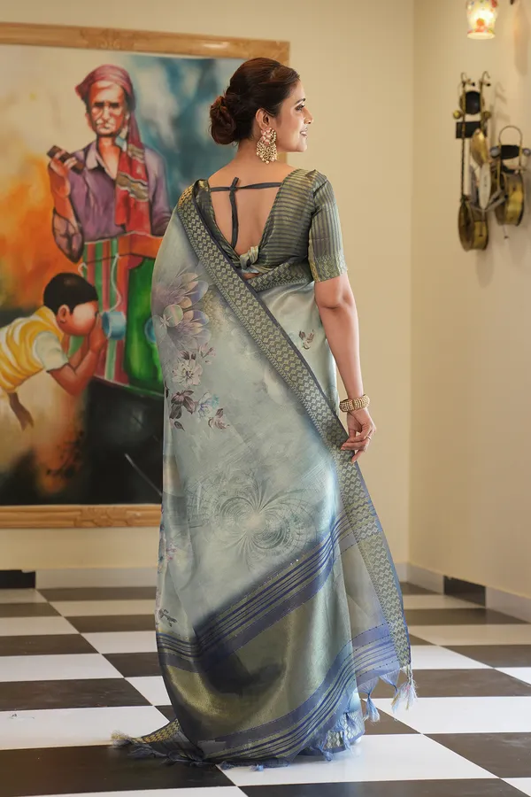 Savya_Blue_–_Diwali_Special_|_Soft_Tissue_Silk_Saree_with_Digital_Print,_Border_&_Rich_Pallu,_Sequence_&_Contrast_Print_Blouse_with_Tassels