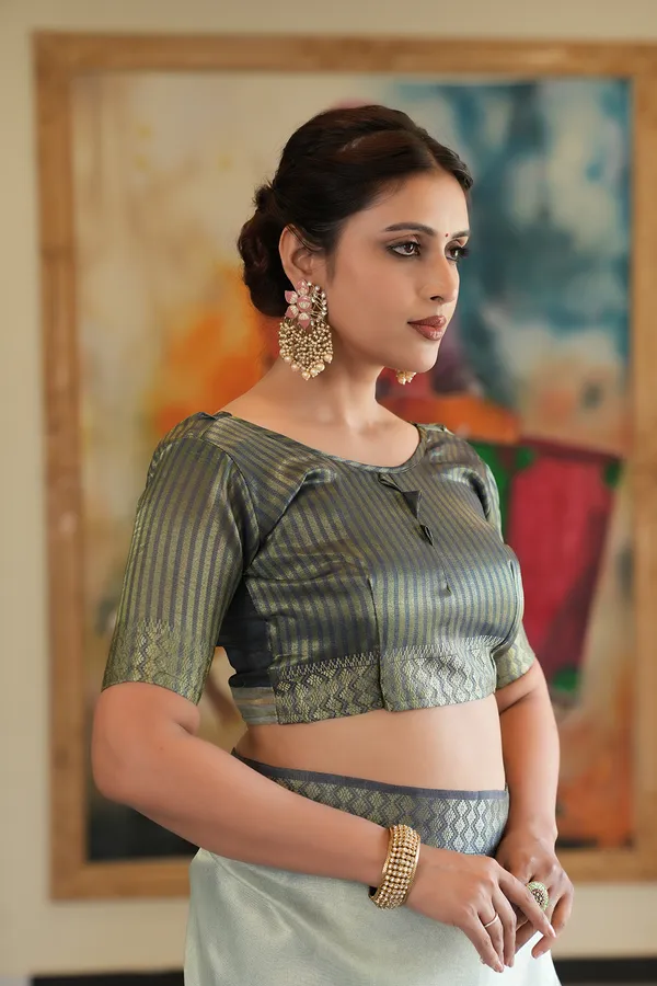 Savya_Blue_–_Diwali_Special_|_Soft_Tissue_Silk_Saree_with_Digital_Print,_Border_&_Rich_Pallu,_Sequence_&_Contrast_Print_Blouse_with_Tassels