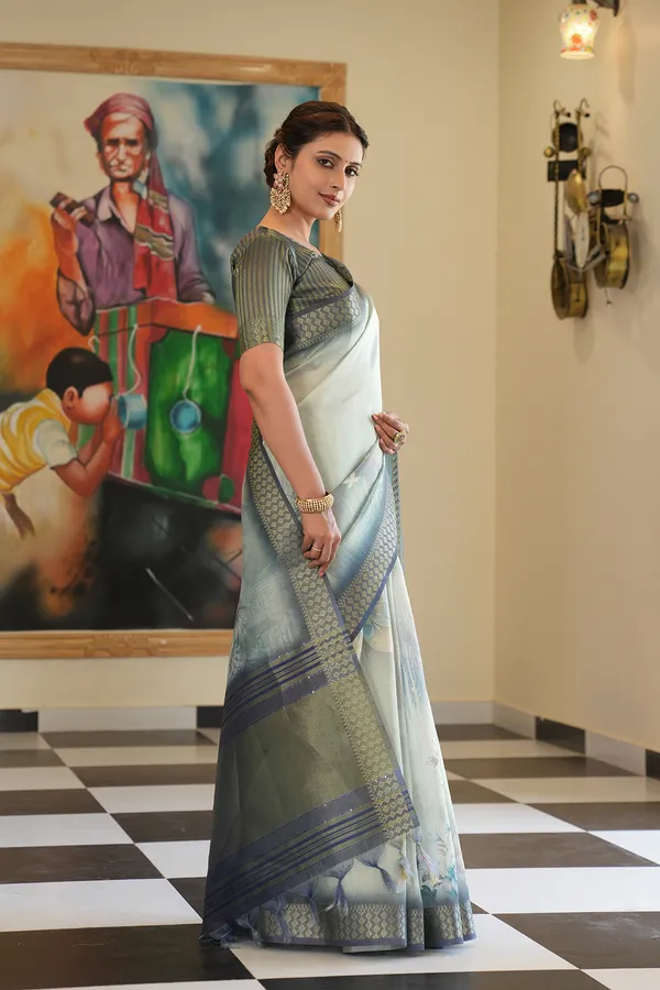 Savya_Blue_–_Diwali_Special_|_Soft_Tissue_Silk_Saree_with_Digital_Print,_Border_&_Rich_Pallu,_Sequence_&_Contrast_Print_Blouse_with_Tassels