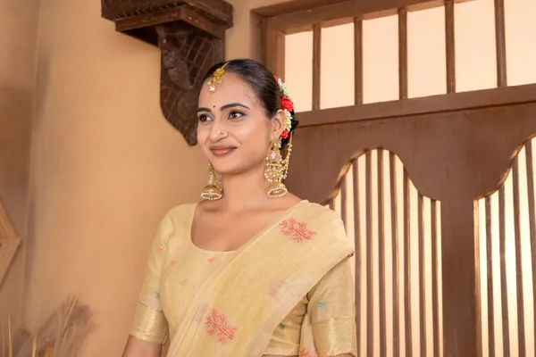 Grisha_Cream_–_Floral_Pallu_Wedding_Special_|_Premium_Soft_Muga_Cotton_Saree_with_Colourful_Resham_Weaving_Flower_Design_Pallu