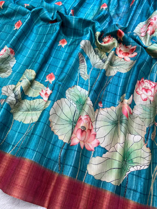 Avanti_Rama_Green_–_Regal_Navratri_Special_|_Soft_Tussar_Silk_Saree_with_Print,_Border_&_Contrast_Print_Blouse_with_Tassels