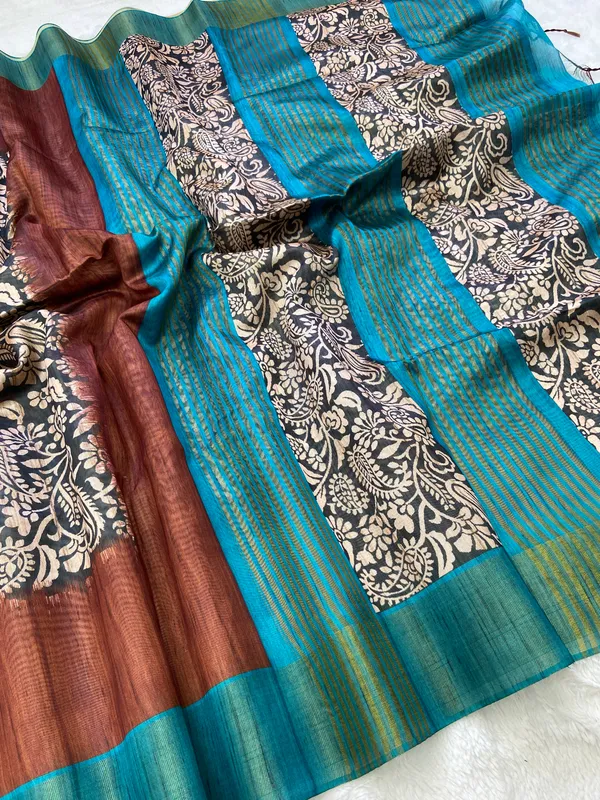 Mirza_Rama_Green_&_Coffee_Brown_–_Festive_Season_Special_|_Soft_Tussar_Silk_Saree_with_Print,_Border_&_Contrast_Print_Blouse_with_Tassels