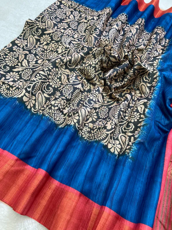 Mirza_Red_&_Blue_–_Diwali_Special_|_Soft_Tussar_Silk_Saree_with_Print,_Border_&_Contrast_Print_Blouse_with_Tassels