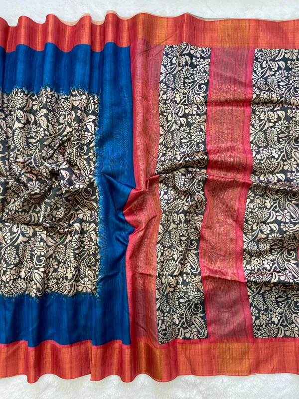 Mirza_Red_&_Blue_–_Diwali_Special_|_Soft_Tussar_Silk_Saree_with_Print,_Border_&_Contrast_Print_Blouse_with_Tassels