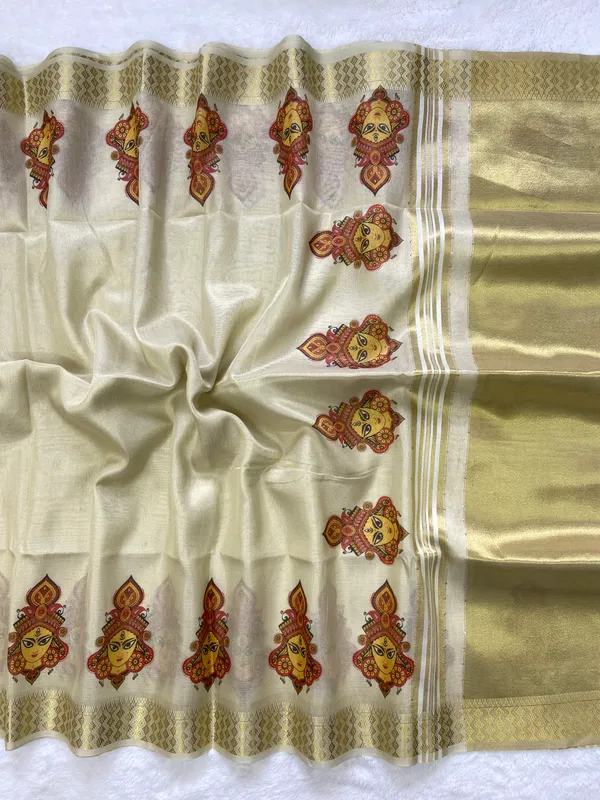 Anvika_Kali_Off_White_–_Diwali_Special_|_Soft_Tissue_Silk_Saree_with_Weaving,_Border_&_Rich_Pallu,_Sequence_&_Contrast_Print_Blouse_with_Tassels
