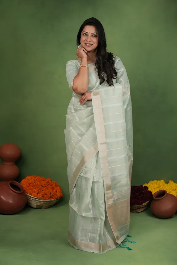Soft_Linen_Cotton_Silk_sarees_with_Beautiful_Weaving__Zari_Butti_Design_With_Attractive_Border_&_Rich_Pallu__And_Running__Plain_Blouse_With_Tassels