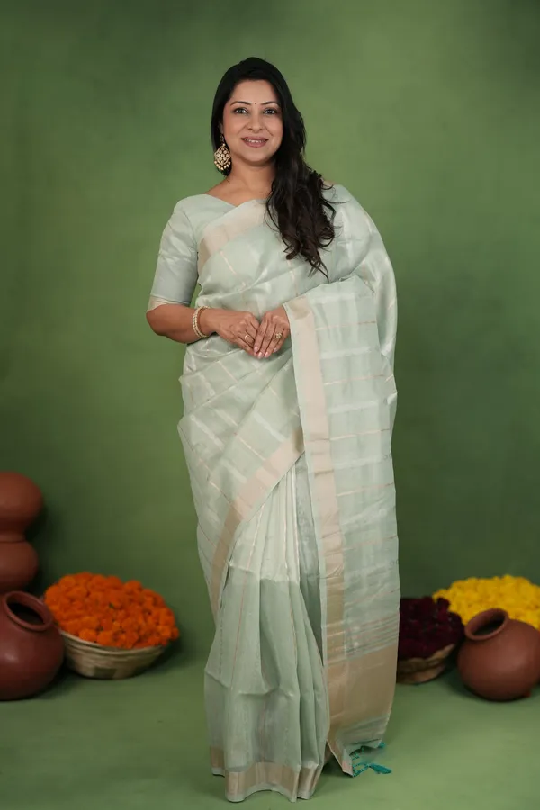 Soft_Linen_Cotton_Silk_sarees_with_Beautiful_Weaving__Zari_Butti_Design_With_Attractive_Border_&_Rich_Pallu__And_Running__Plain_Blouse_With_Tassels