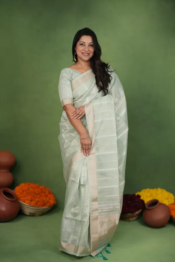 Soft_Linen_Cotton_Silk_sarees_with_Beautiful_Weaving__Zari_Butti_Design_With_Attractive_Border_&_Rich_Pallu__And_Running__Plain_Blouse_With_Tassels