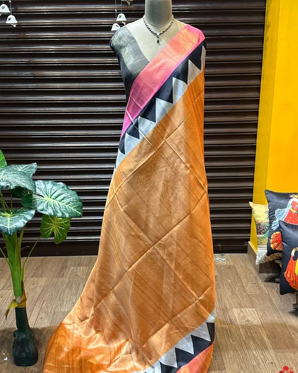 Anjali_Orange_–_Devotional_Diwali_Special_|_Soft_Tussar_Silk_Saree_with_Print,_Border_&_Contrast_Print_Blouse_with_Tassels