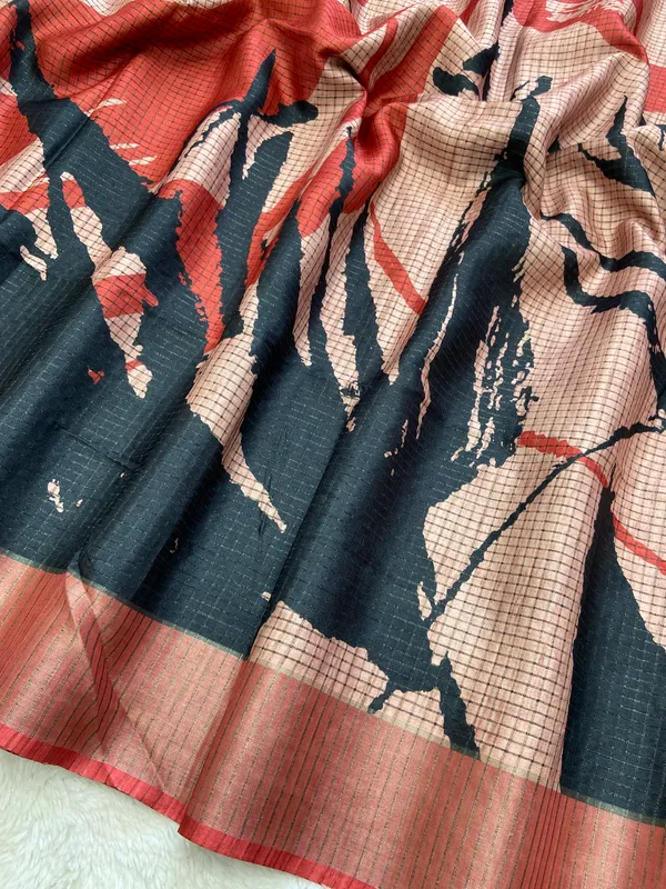 Aarathi_Black_&_Red_–_Aarti_Glow_Diwali_Special_|_Soft_Tussar_Silk_Saree_with_Digital_Print,_Checks_Design_Saree_&_Digital_Print_Blouse_with_Tassels