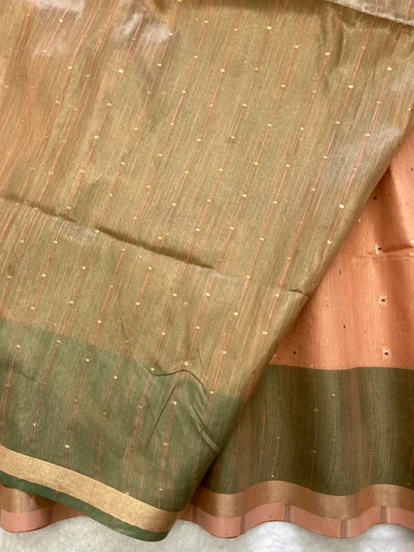 Sarika_Orange_–_Diwali_Special_|_Soft_Tissue_Linen_Silk_Saree_with_Weaving,_Border_&_Rich_Pallu,_Sequence_&_Running_Blouse_with_Tassels